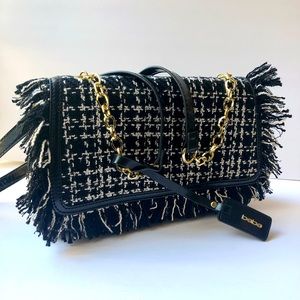 Black & white Bebe purse, new without tags